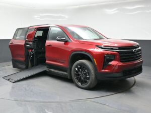 Red Chevrolet Traverse with BraunAbility Side Entry Automatic In Floor conversion