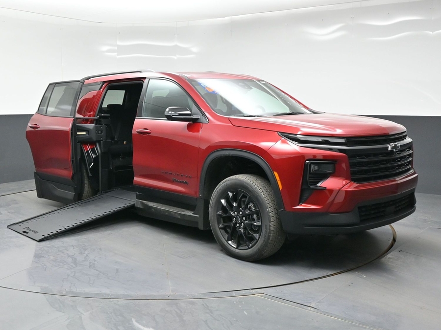 Red Chevrolet Traverse with BraunAbility Side Entry Automatic In Floor conversion