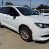 White Chrysler Voyager with BraunAbility Rear Entry Manual Fold Out conversion