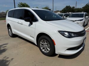 White Chrysler Voyager with BraunAbility Rear Entry Manual Fold Out conversion