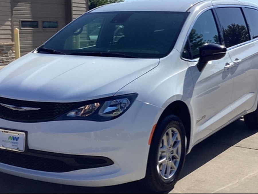 White Chrysler Voyager with BraunAbility Rear Entry Manual Fold Out conversion