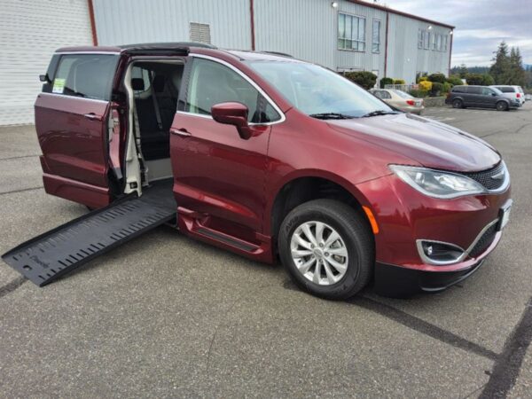 Red Chrysler Pacifica with BraunAbility Side Entry Automatic Fold Out conversion