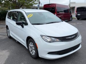 White Chrysler Voyager with Driverge Side Entry Automatic Fold Out conversion