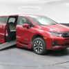 Red Honda Odyssey with BraunAbility Side Entry Automatic In Floor conversion