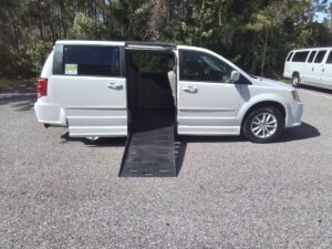 White Dodge Grand Caravan with BraunAbility Side Entry Automatic Fold Out conversion