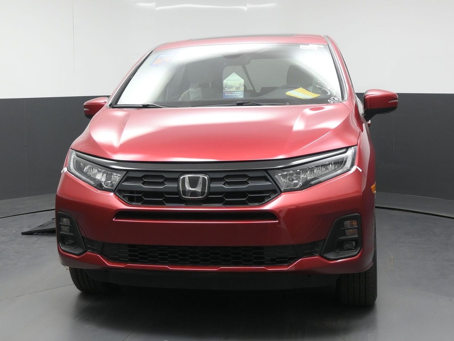 Red Honda Odyssey with BraunAbility Side Entry Automatic In Floor conversion
