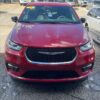 Red Chrysler Pacifica with BraunAbility Side Entry Automatic In Floor conversion