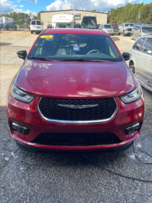 Red Chrysler Pacifica with BraunAbility Side Entry Automatic In Floor conversion