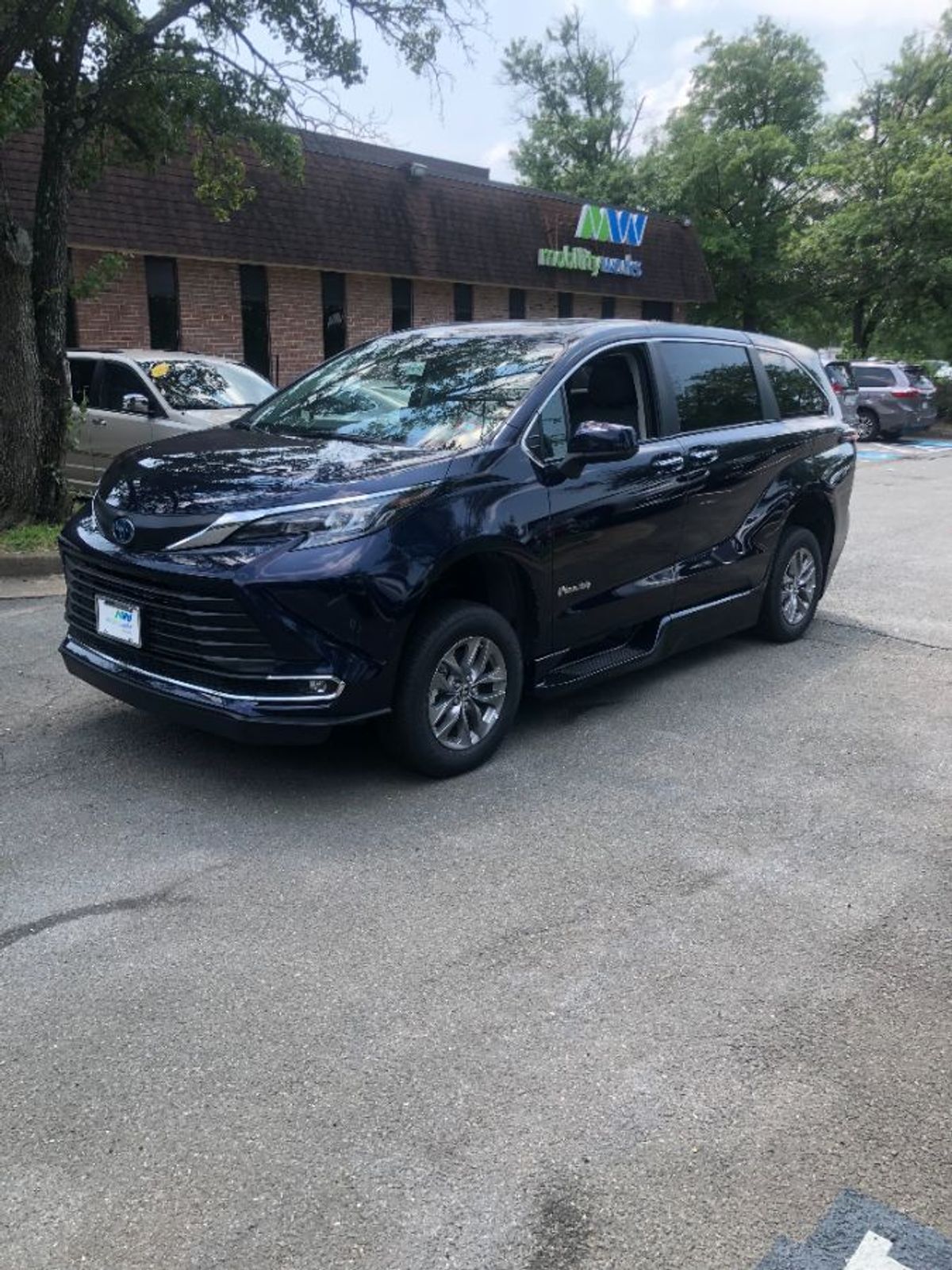 Blue Toyota Sienna with BraunAbility Side Entry Automatic Fold Out conversion