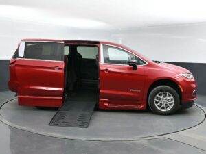 Red Chrysler Pacifica with BraunAbility Side Entry Automatic Fold Out conversion