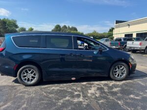 Blue Chrysler Pacifica with Adaptive Vans Side Entry Automatic Fold Out conversion