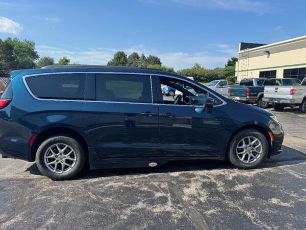 Blue Chrysler Pacifica with Adaptive Vans Side Entry Automatic Fold Out conversion