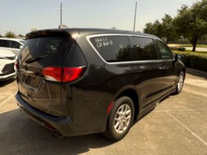 Black Chrysler Voyager with Driverge Side Entry Automatic Fold Out conversion