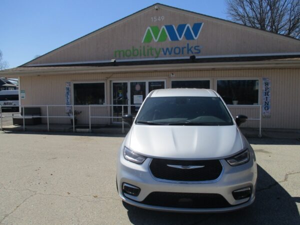 Silver Chrysler Pacifica with Driverge Side Entry Automatic Fold Out conversion