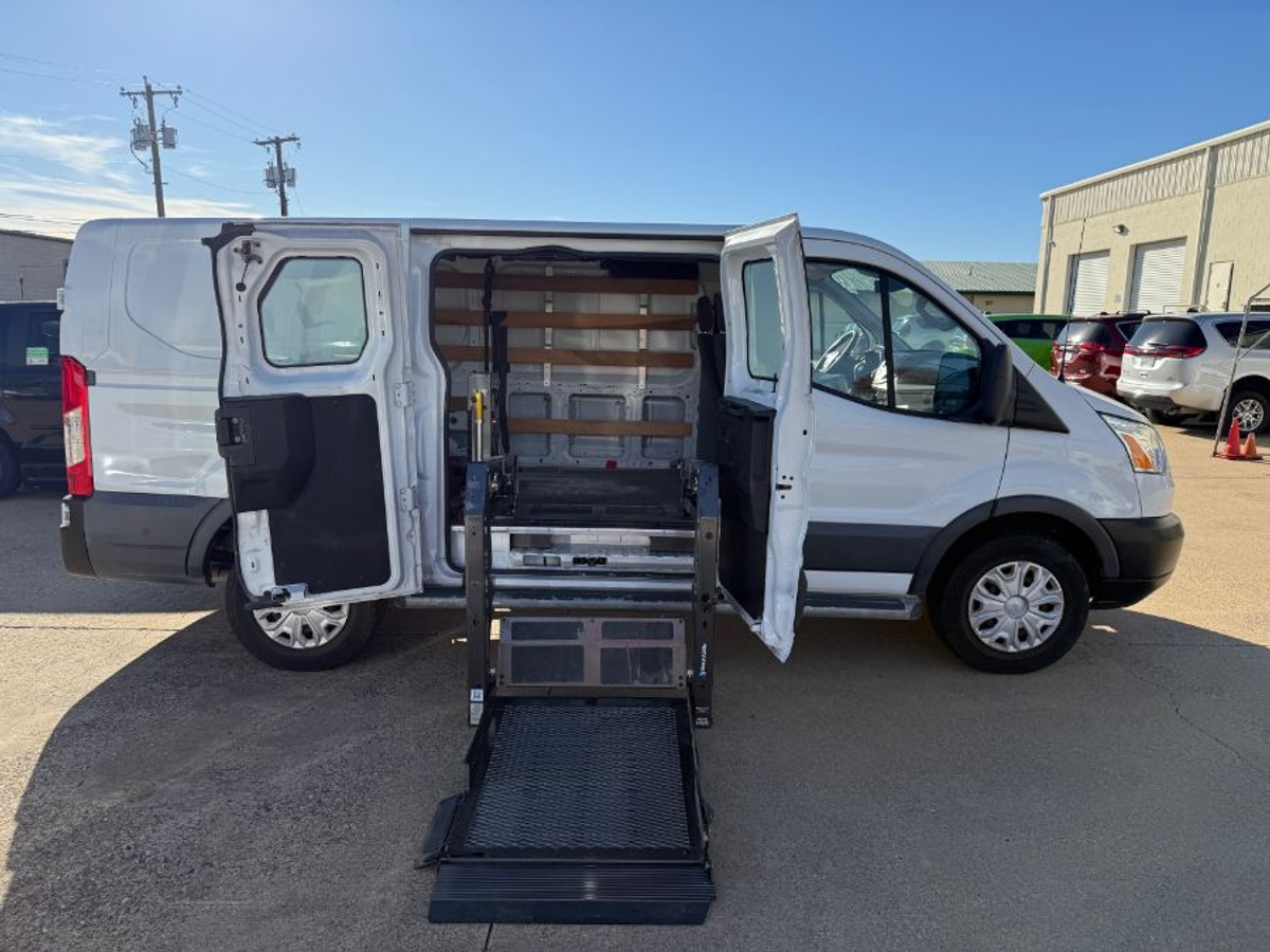 White Ford T250 with Driverge Side Entry Automatic Fold Out conversion