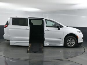 White Chrysler Pacifica with BraunAbility Side Entry Automatic Fold Out conversion