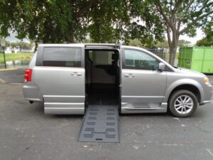 Silver Dodge Grand Caravan with BraunAbility Side Entry Automatic Fold Out conversion