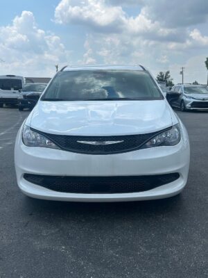 White Chrysler Voyager with Driverge Side Entry Automatic Fold Out conversion