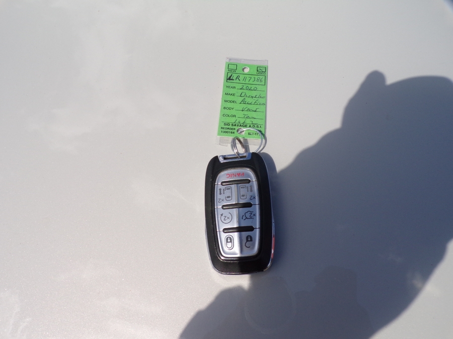 White Chrysler Pacifica with Vantage Mobility Side Entry Automatic In Floor conversion