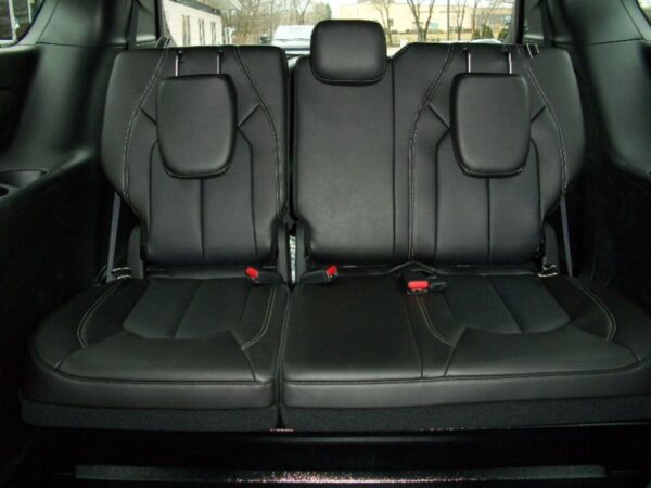 Black Chrysler Pacifica with Driverge Side Entry Automatic Fold Out conversion