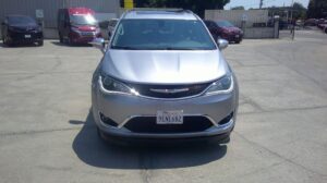 Silver Chrysler Pacifica with BraunAbility Side Entry Automatic Fold Out conversion