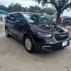Black Chrysler Pacifica with Driverge Rear Entry Manual Fold Out conversion