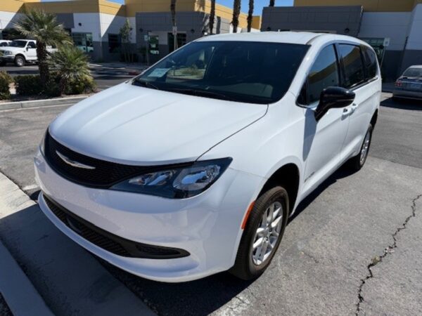 White Chrysler Voyager with BraunAbility Rear Entry Manual Fold Out conversion