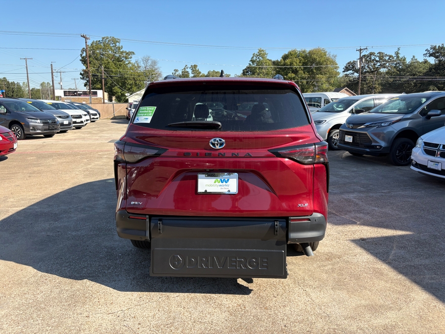 Red Toyota Sienna with Driverge Rear Entry Manual Fold Out conversion