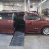 Red Toyota Sienna with BraunAbility Side Entry Automatic Fold Out conversion