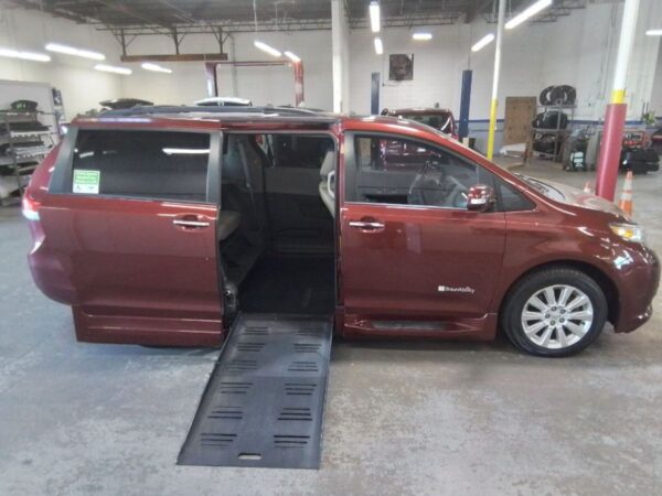 Red Toyota Sienna with BraunAbility Side Entry Automatic Fold Out conversion