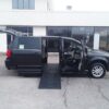 Black Dodge Grand Caravan with BraunAbility Side Entry Automatic Fold Out conversion