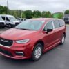 Red Chrysler Pacifica with BraunAbility Side Entry Automatic Fold Out conversion
