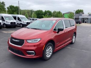 Red Chrysler Pacifica with BraunAbility Side Entry Automatic Fold Out conversion