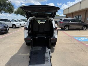 White Toyota Sienna with BraunAbility Rear Entry Manual Fold Out conversion