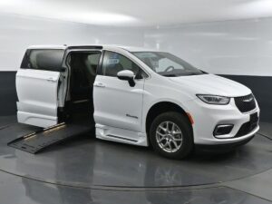 White Chrysler Pacifica with BraunAbility Side Entry Automatic Fold Out conversion