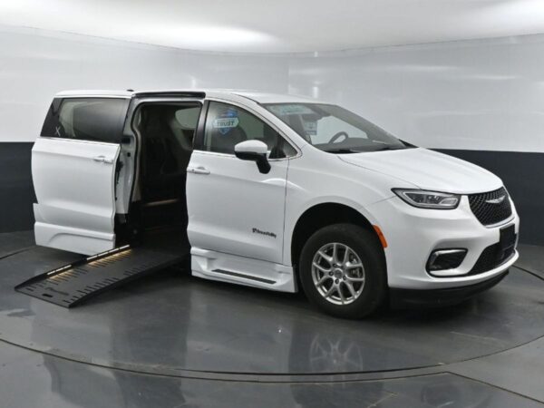 White Chrysler Pacifica with BraunAbility Side Entry Automatic Fold Out conversion