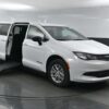White Chrysler Voyager with BraunAbility Side Entry Manual Fold Out conversion