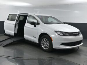 White Chrysler Voyager with BraunAbility Side Entry Manual Fold Out conversion