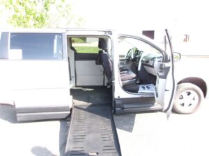 Silver Dodge Grand Caravan with BraunAbility Side Entry Automatic Fold Out conversion