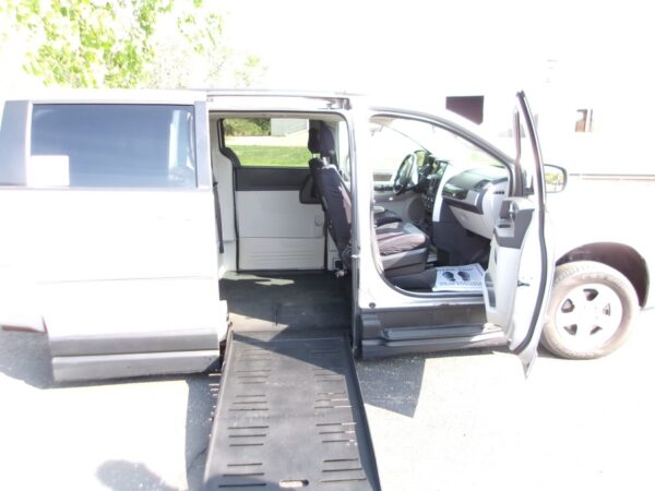 Silver Dodge Grand Caravan with BraunAbility Side Entry Automatic Fold Out conversion