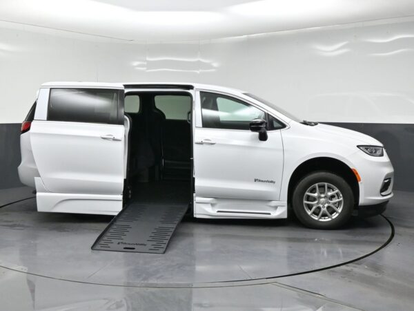 White Chrysler Pacifica with BraunAbility Side Entry Automatic Fold Out conversion