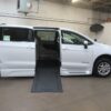 White Chrysler Voyager with BraunAbility Side Entry Automatic In Floor conversion