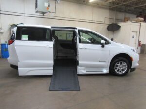 White Chrysler Voyager with BraunAbility Side Entry Automatic In Floor conversion