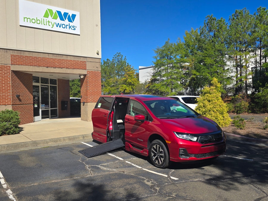 Red Honda Odyssey with BraunAbility Side Entry Automatic In Floor conversion