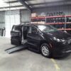 Black Chrysler Voyager with BraunAbility Side Entry Automatic Fold Out conversion
