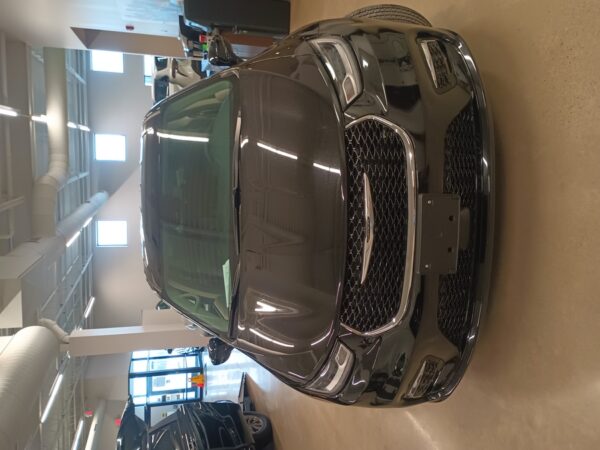 Black Chrysler Pacifica with Driverge Side Entry Automatic Fold Out conversion