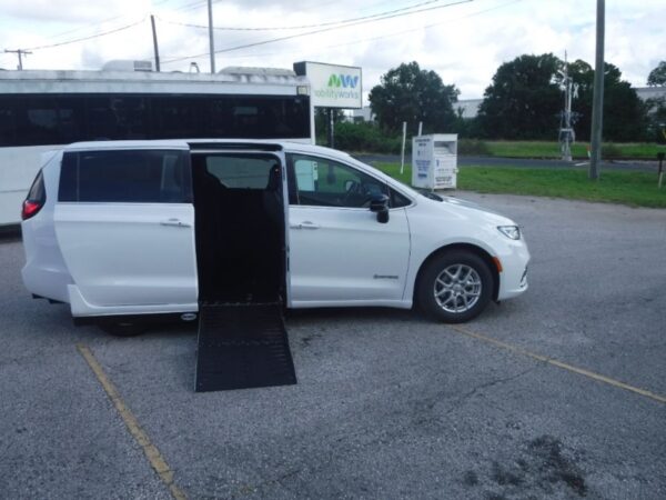 White Chrysler Pacifica with Driverge Side Entry Automatic Fold Out conversion