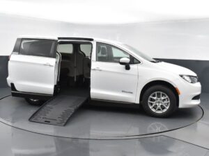 White Chrysler Voyager with BraunAbility Side Entry Manual Fold Out conversion