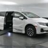 White Honda Odyssey with BraunAbility Side Entry Automatic In Floor conversion