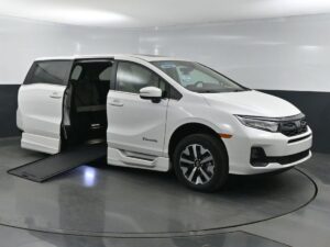 White Honda Odyssey with BraunAbility Side Entry Automatic In Floor conversion